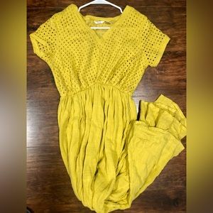 Golden Yellow Boho Maxi Dress with a v-neckline and perforated top features.